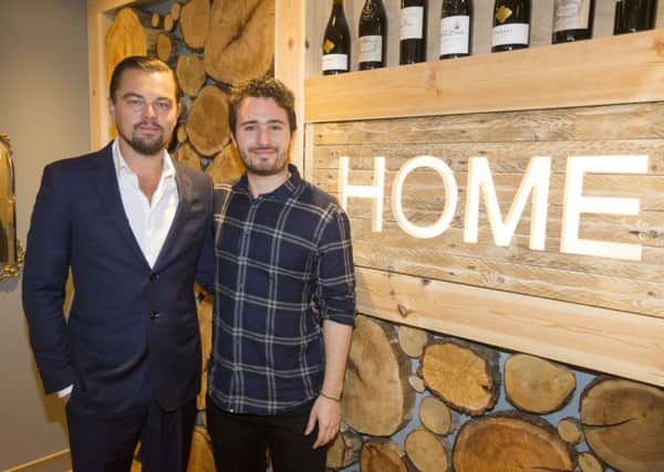Leonardo diCaprio with  social entrepreneur Josh Littlejohn at Home, the new pay it forward restaurant. Picture: Getty Images