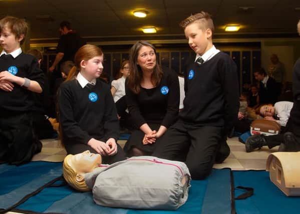 Public Health Minister Aileen Campbell attends a CPR training event at Beeslack High School