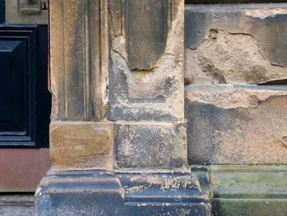 Stonework damaged through rising damp is said to be affecting buildings through Edinburgh's world heritage site.