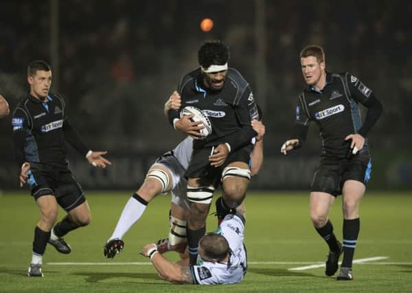 Warriors' Brian Alainu'uese breaks through the Ospreys defence. The Glasgow player was later sent off. Picture: Gary Hutchison/SNS/SRU