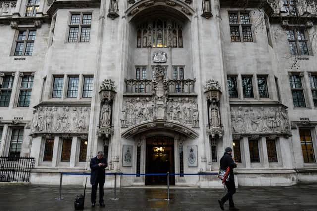 LONDON, ENGLAND - MARCH 01:  The Supreme Court where judges are to consider appeals over the 'bedroom tax' on March 1, 2016 in London, England. Also known as under occupancy or the spare room subsidy, the bedroom rax deducts 14% from the benefit of a tenant if they have an unused bedroom.  (Photo by Chris Ratcliffe/Getty Images)