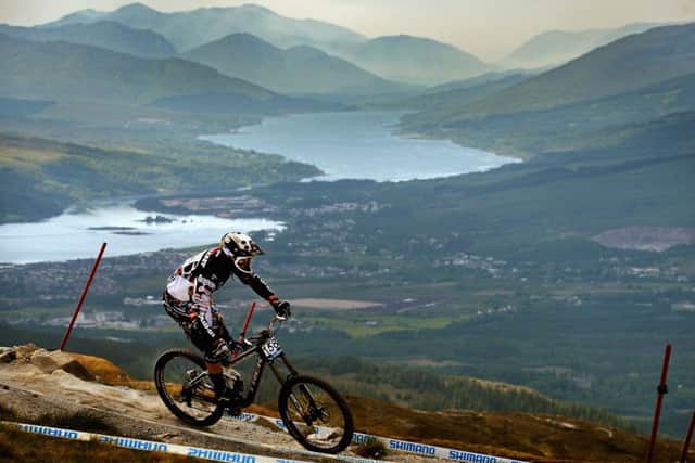 Fabbien Cousine of France competes in the men's downhill qualifying round at the UCI Mountain Bike World Cup in Fort William. (Photo by Jeff J Mitchell/Getty Images)