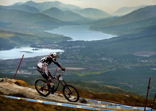 Fabbien Cousine of France competes in the men's downhill qualifying round at the UCI Mountain Bike World Cup in Fort William. (Photo by Jeff J Mitchell/Getty Images)