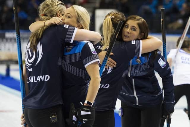 Scotland celebrate winning bronze at the European Curling Championships at Braehead. Picture: Paul Devlin/SNS