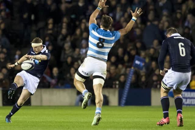 Finn Russell in kicking mode during last week's victory over Argentina. Picture: SNS/SRU.