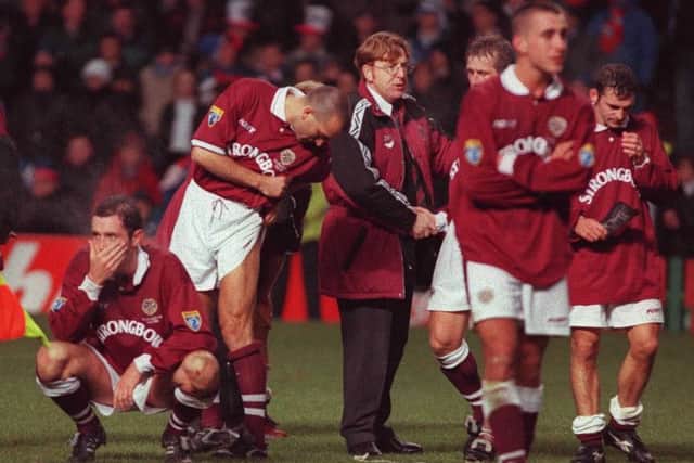 Hearts players are left despondent after a heroic performance in their 1996 League Cup Final defeat to Rangers.
