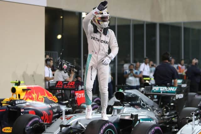 Mercedes' Lewis Hamilton celebrates qualifying in pole position at Yas Marina Circuit, Abu Dhabi. Picture: David Davies/PA Wire