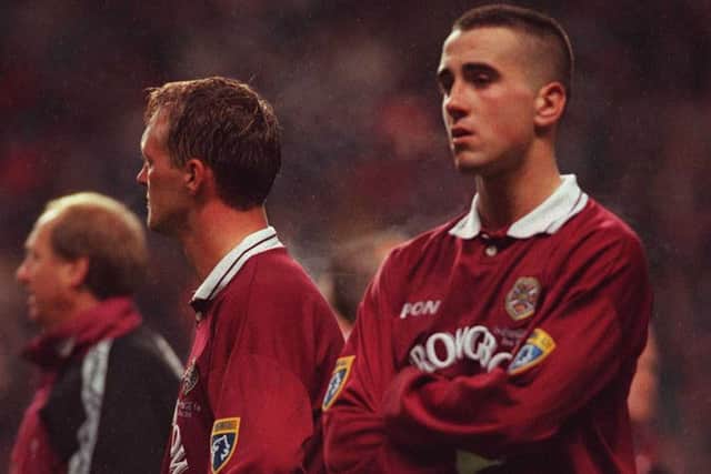 Hearts defender Paul Ritchie, right, is left distraught at Celtic Park after his side's 4-3 defeat to Rangers in the 1996 Scottish League Cup final.