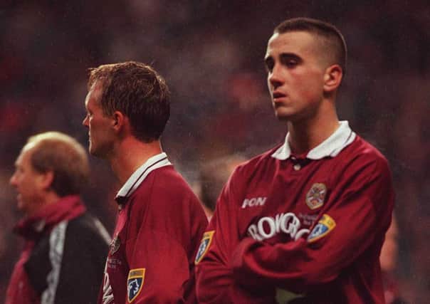 Hearts defender Paul Ritchie, right, is left distraught at Celtic Park after his side's 4-3 defeat to Rangers in the 1996 Scottish League Cup final.