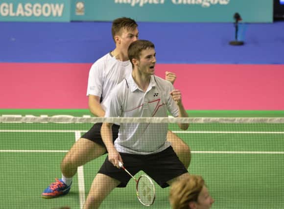 Adam Hall, front, and Peter Mills celebrate reaching the mens finals at the Scottish Open Grand Prix. Picture: Lorraine Hill