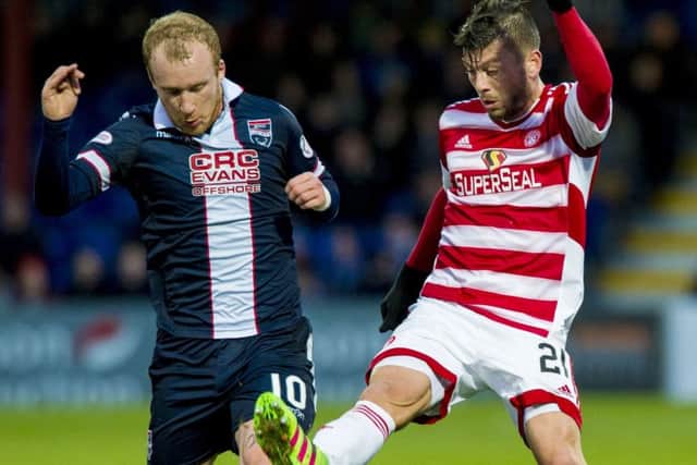 Accies Massimo Donati, right, puts a challenge in on Countys Liam Boyce. Picture: Sammy Turner/SNS