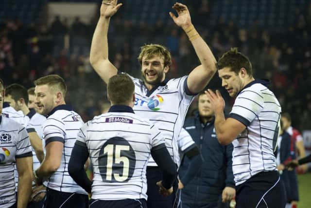 Pack power: Richie Gray leads the celebrations as the final whistle blows. Picture: Paul Devlin/SNS