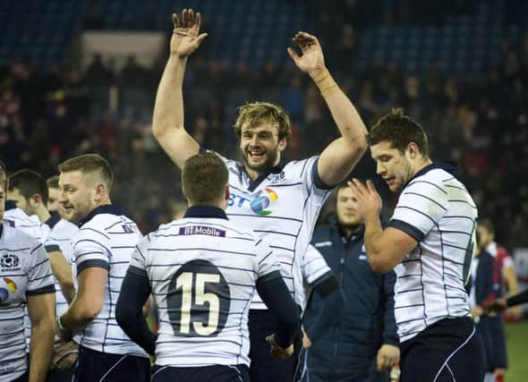Pack power: Richie Gray leads the celebrations as the final whistle blows. Picture: Paul Devlin/SNS