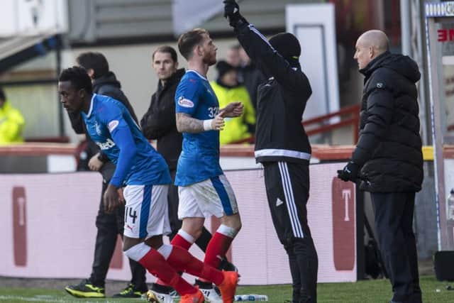 Rangers' Joe Dodoo (left) replaces Joe Garner on the hour mark at Firhill. Picture: Craig Williamson/SNS
