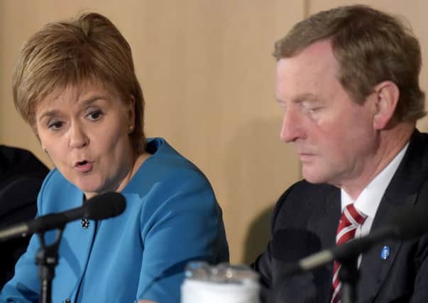 Nicola Sturgeon alongside Taoiseach Enda Kenny at a press conference during a last week's British-Irish Council Summit meeting . Picture: Jane Barlow/PA Wire