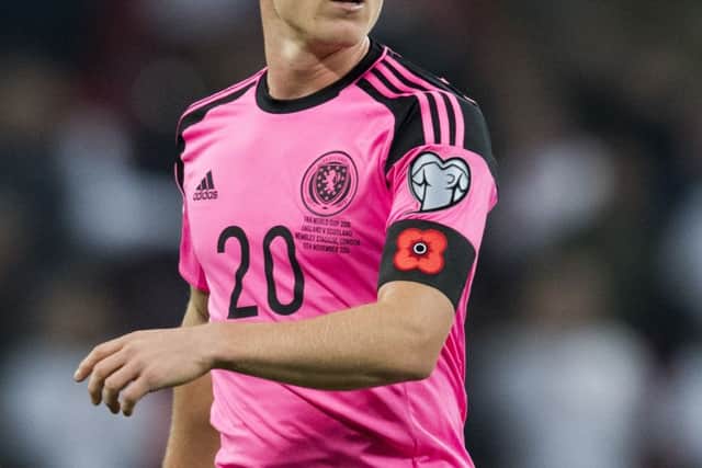 A poppy on an armband in the England v Scotland clash.