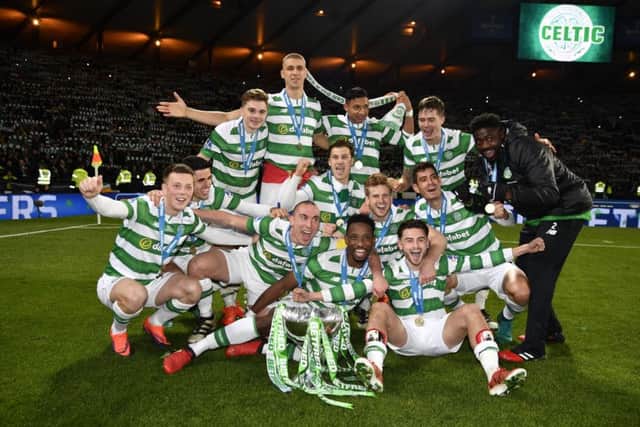 Celtic's Betfred Cup winners celebrate their 3-0 victory over Aberdeen at Hampden Park. Picture: Rob Casey/SNS