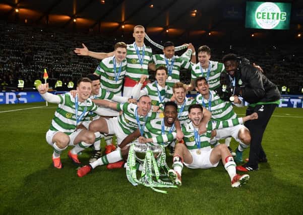 Celtic's Betfred Cup winners celebrate their 3-0 victory over Aberdeen at Hampden Park. Picture: Rob Casey/SNS