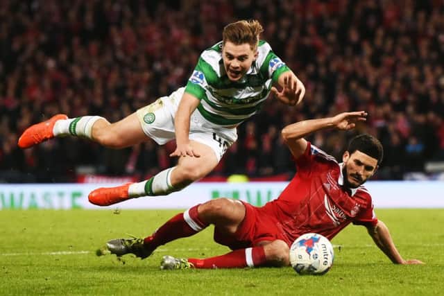 James Forrest, left, is fouled by Aberdeen defender Anthony O'Connor inside the penalty area. Picture: SNS