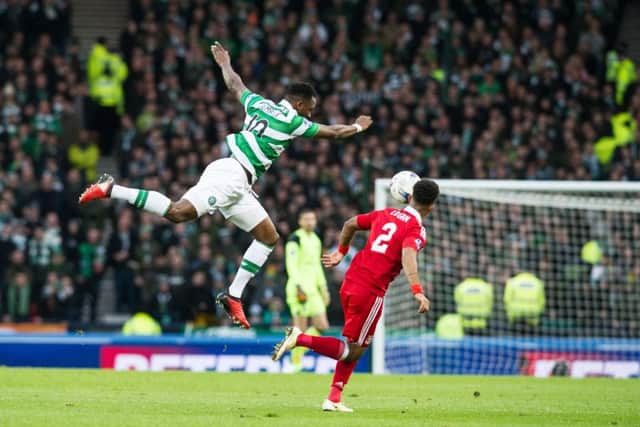 Moussa Dembele battles for possession during the Betfred Cup final. Picture: John Devlin