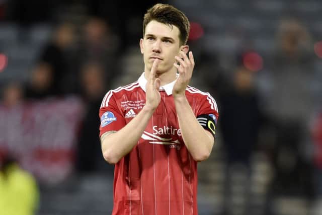 Aberdeen's Ryan Jack applauds the fans at full time. Picture: SNS