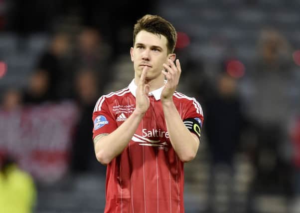 Aberdeen's Ryan Jack applauds the fans at full time. Picture: SNS