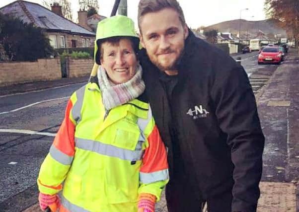 Andy Noble with lollipop lady Elizabeth. Picture: Andy Noble/Facebook