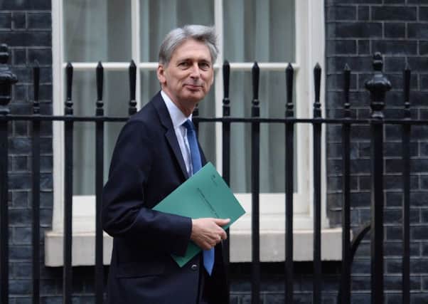 Chancellor Philip Hammond leaves Downing St to deliver his Autumn Statement. Picture: PA