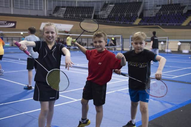 Young enthusiasts. left to right, Iona Muir, Lewis Smith and Finn Callister at the Emirates Arena. Picture: Lorraine Hill.