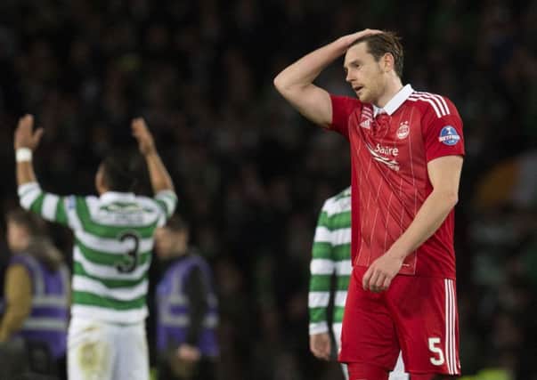 Dejection for Aberdeen's Ash Taylor as his side lose the League Cup final to Celtic. Picture: SNS