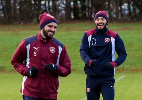 Could Alim Ozturk, left, and Tony Watt be two players Hearts are looking to move in January? Picture: SNS