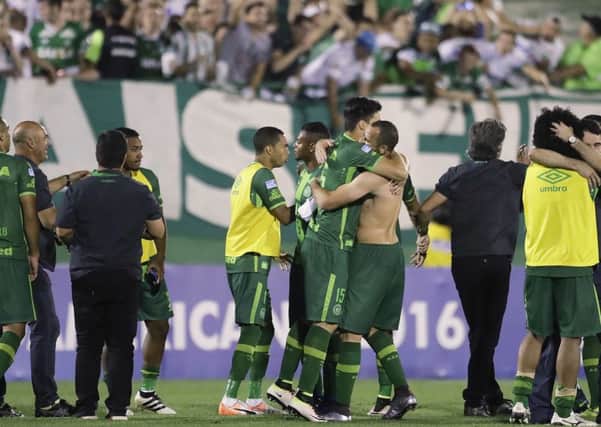 Players of Brazil's Chapecoense. A chartered aircraft with 81 people on board, including players from Chapecoense, heading to Colombia for a regional tournament final, has crashed on its way to Medellin's international airport in Colombia. (AP Photo/Andre Penner, File)