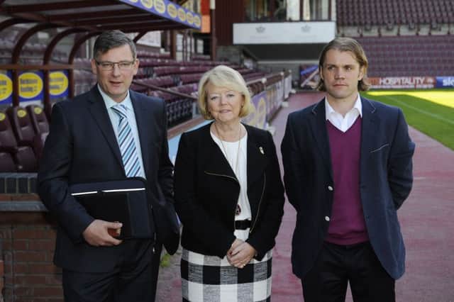 Director of football Craig Levein, left, and owner Ann Budge are preparing for life at Hearts without Robbie Neilson, right. Picture: Greg Macvean