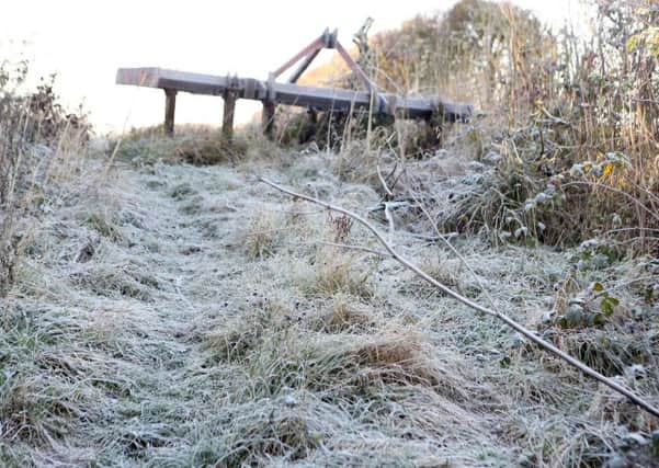 Frost on a field near Kingsclere, Hampshire, after one of England's coldest nights of the autumn so far this year.  Steve Parsons/PA Wire