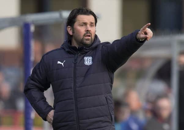 Dundee boss Paul Hartley is said to be among the leading candidates. Picture: SNS