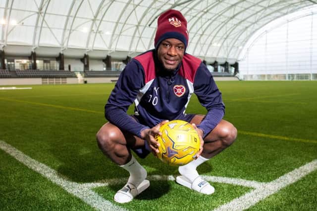 Midfielder Arnaud Djoum hopes his form for Hearts will earn him a call-up for Cameroon in the African Nations Cup.