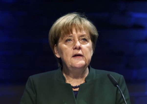 German Chancellor Angela Merkel has rebuffed early attempts to secure rights for Britons living and working in the EU. Picture: AP