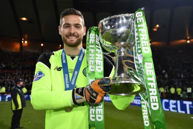 Craig Gordon with the Betfred Cup trophy after Celtic defeated Aberdeen. Picture: SNS