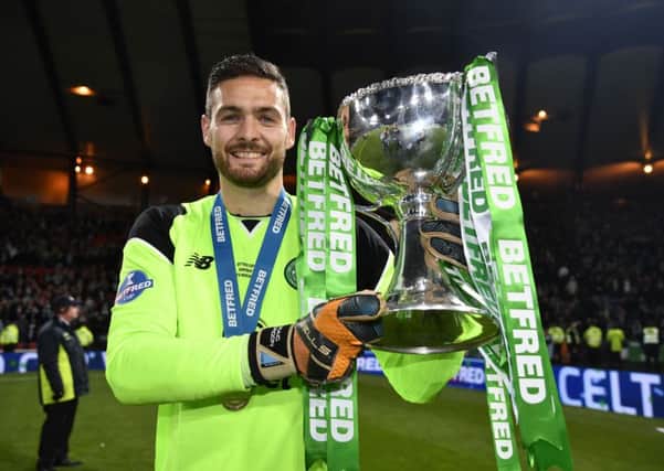 Craig Gordon with the Betfred Cup trophy after Celtic defeated Aberdeen. Picture: SNS