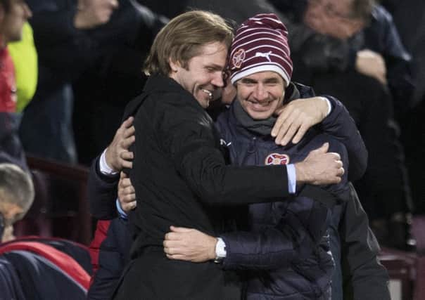 Robbie Neilson and No 2 Stevie Crawford, both set to quit Hearts for MK Dons, celebrate their current sides emphatic 2-0 victory over Rangers. Picture: Craig Williamson/SNS