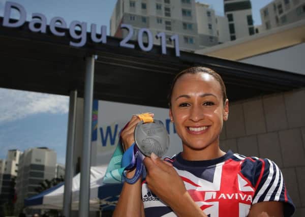 Great Britain's Jessica Ennis-Hill  with the Daegu 2011 heptathlon silver medal which will be upgraded to gold. Picture: Dave Thompson/PA Wire