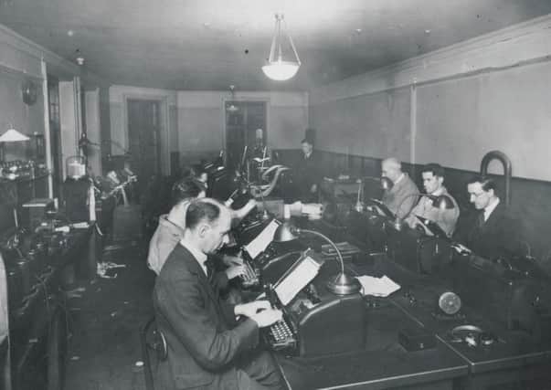 Journalists at work in The Scotsman's former offices on North Bridge. Picture: Contributed