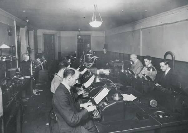 Journalists at work in The Scotsman's former offices on North Bridge. Picture: Contributed
