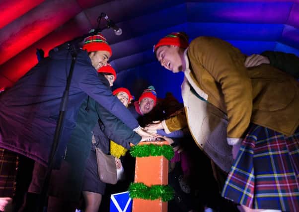 "The Andrews" help to switch on the Christmas Lights in St Andrews. Picture: Steven Brown