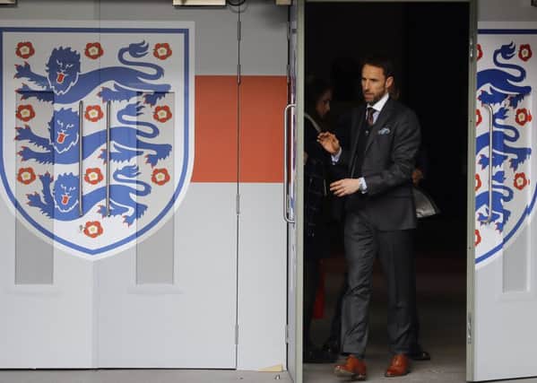 Gareth Southgate arrives for his unveiling as England manager at Wembley. Picture: AP Photo/Frank Augstein