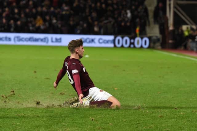 Robbie Muirhead celebrates his opening goal. Picture: SNS