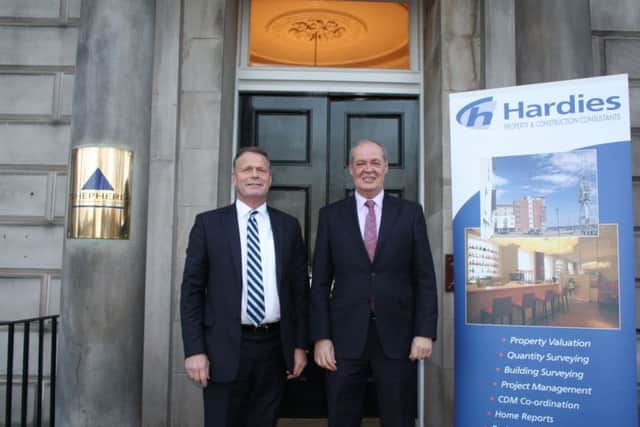 George Brewster, managing partner of Shepherd, and Derek Ferrier, managing partner of Hardies, announce merger of firms. Picture: Contributed