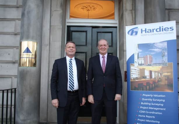 George Brewster, managing partner of Shepherd, and Derek Ferrier, managing partner of Hardies, announce merger of firms. Picture: Contributed