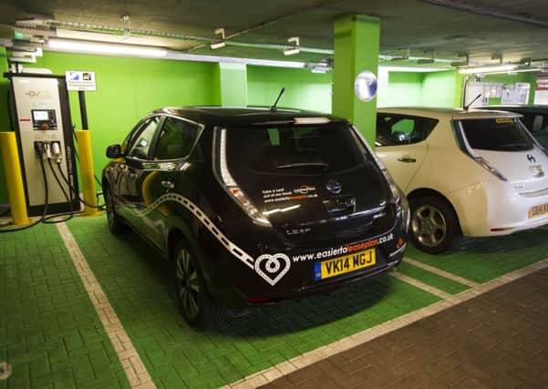 New car electric charging stations installed in the car park at Fountain Park in Edinburgh. Picture: Steven Scott Taylor