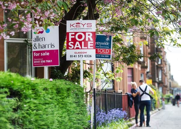 Glasgow properties with For Sale signs Pic: John Devlin